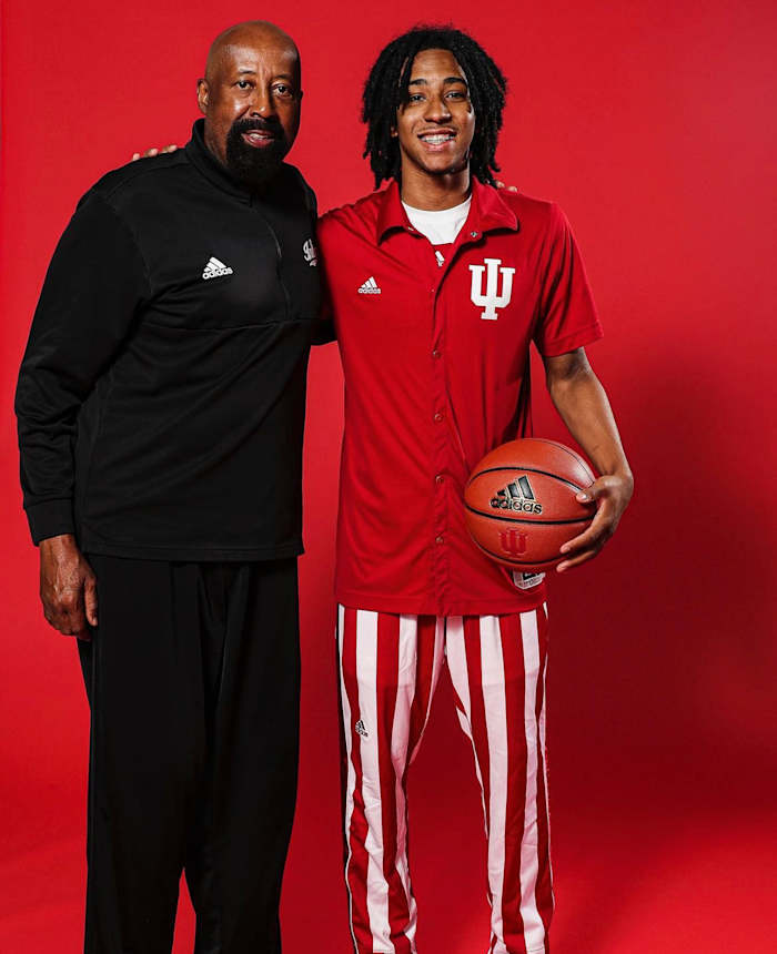 Boogie Fland, a five-star point guard in the class of 2024, is pictured with Indiana coach Mike Woodson during an official visit to Bloomington in June.